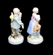 Load image into Gallery viewer, Vintage pair of sweet romantic china boy &amp; girl figurines with doves &amp; flowers
