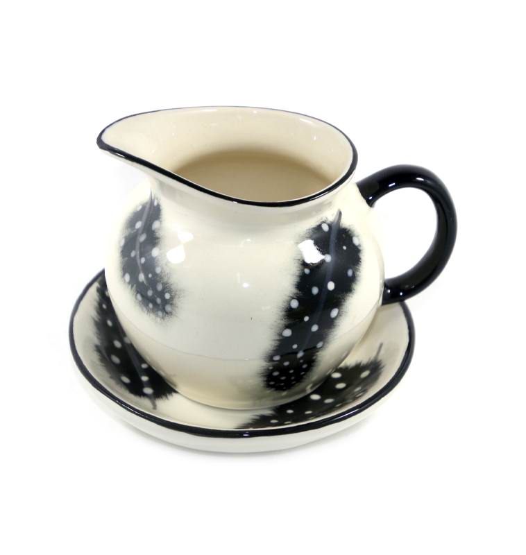 Vintage pottery mid century black & cream feather jug and saucer marked VI