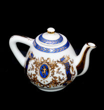 Load image into Gallery viewer, Vintage PORCELAIN ART beautiful blue, white &amp; gilded miniature teapot
