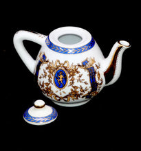 Load image into Gallery viewer, Vintage PORCELAIN ART beautiful blue, white &amp; gilded miniature teapot

