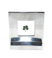 Load image into Gallery viewer, Vintage lucky four leaf clover pressed in silver/chrome frame
