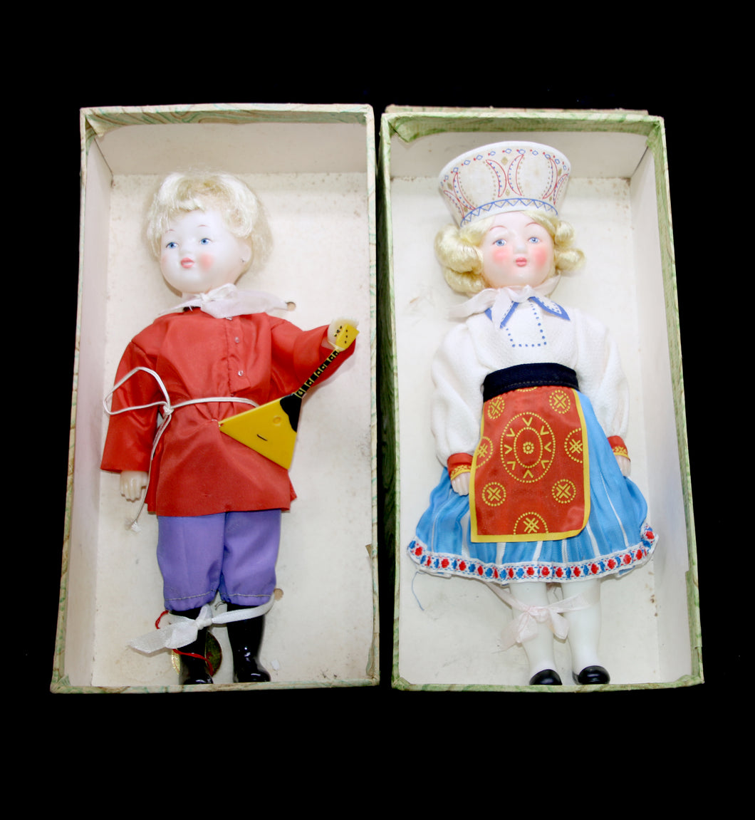 Vintage pair of tall boy and girl RUSSIAN dolls in national folk costume (in boxes)