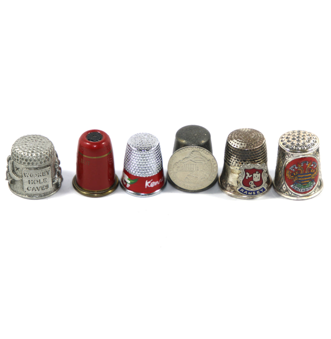 Vintage group of 6 metal collector's thimbles with various designs