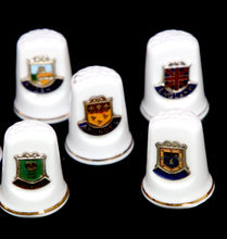 Load image into Gallery viewer, Vintage group of 12 bone china thimbles with castle crest enamel detail
